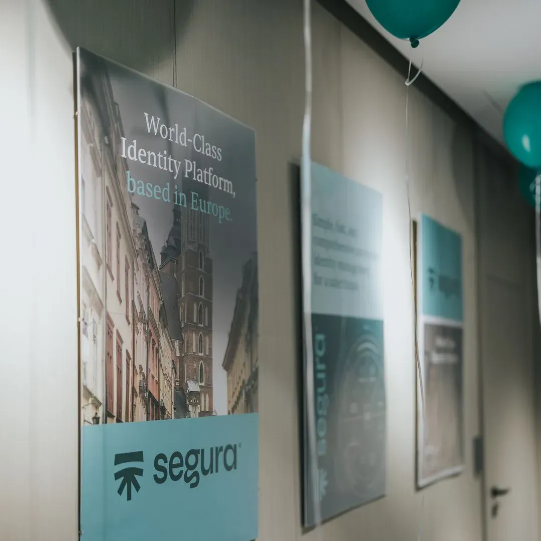 Segura™ posters in a hallway reading “World-Class Identity Platform, based in Europe”