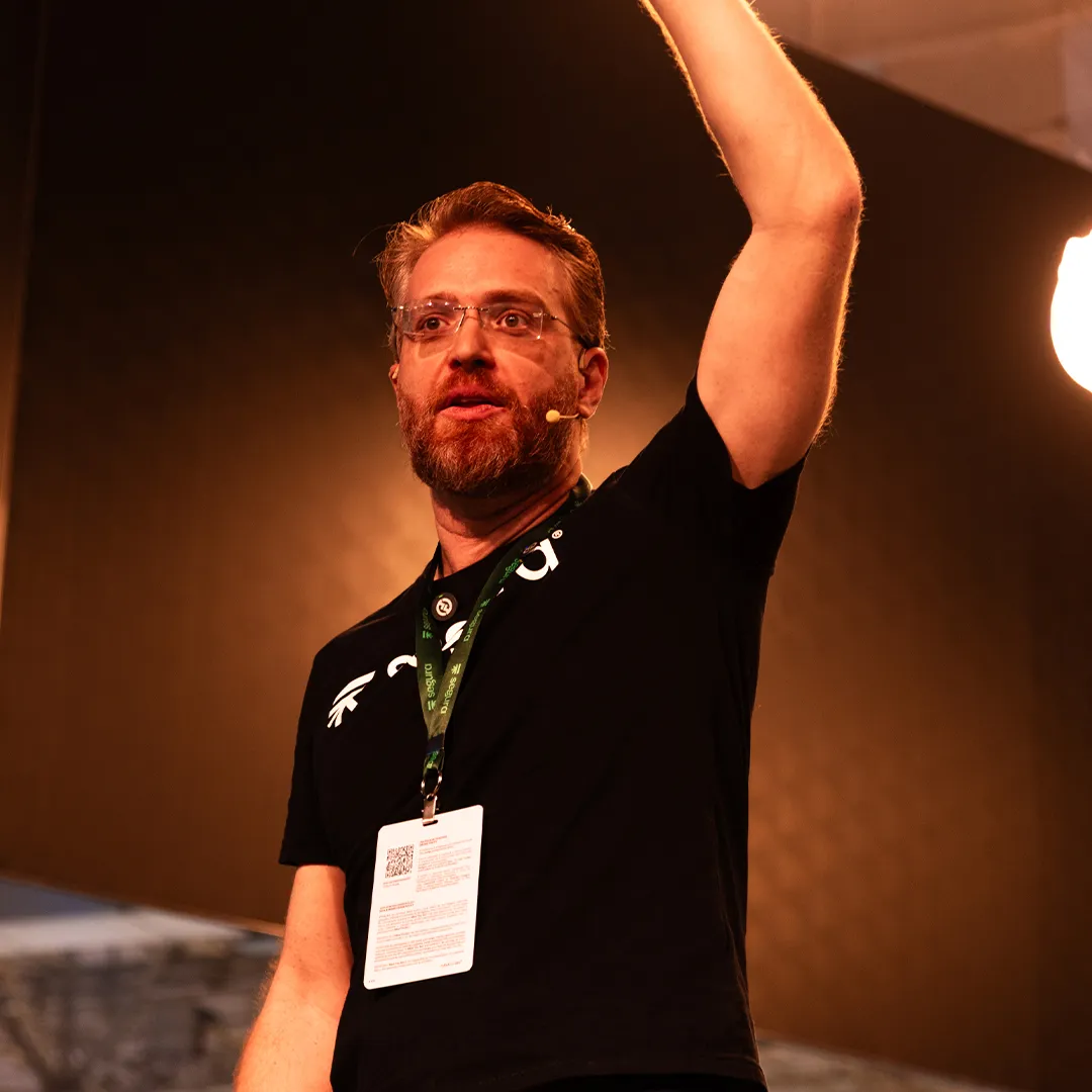 Segura™ team member waving to the crowd at an event